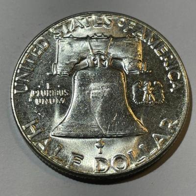 1957-P BU CONDITION FRANKLIN SILVER HALF DOLLAR AS PICTURED.