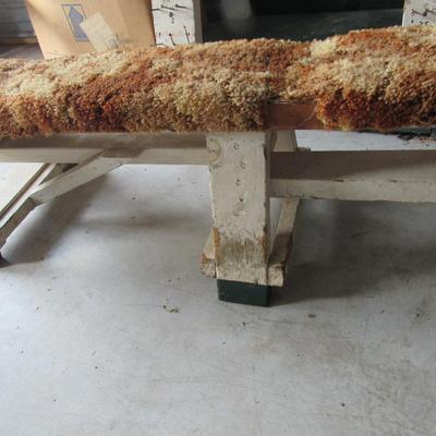 Very Long Sturdy Wood Bench With Carpeting Covering It