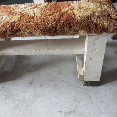 Very Long Sturdy Wood Bench With Carpeting Covering It