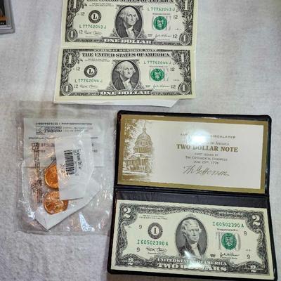 Uncirculated money $2- 2003, (2) $1- 2003 and (2) 2005 $1 coin D Sacagawea