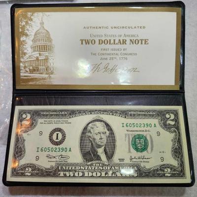 Uncirculated money $2- 2003, (2) $1- 2003 and (2) 2005 $1 coin D Sacagawea