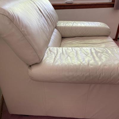 White leather chair and ottoman