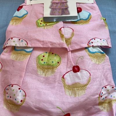 Fun apron, kitchen towels and 2 plastic table covers