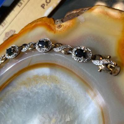 Vintage Sterling Silver Blue Spinel Tennis Bracelet 7-1/2" Long in Very Good Preowned Condition.