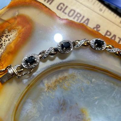 Vintage Sterling Silver Blue Spinel Tennis Bracelet 7-1/2" Long in Very Good Preowned Condition.
