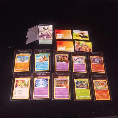 MINT POKEMON CARDS AND A STACK OF BONE CARDS