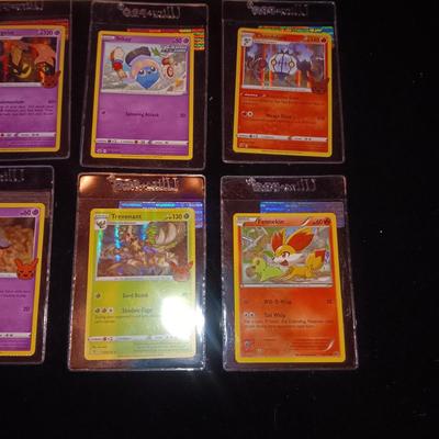 MINT POKEMON CARDS AND A STACK OF BONE CARDS