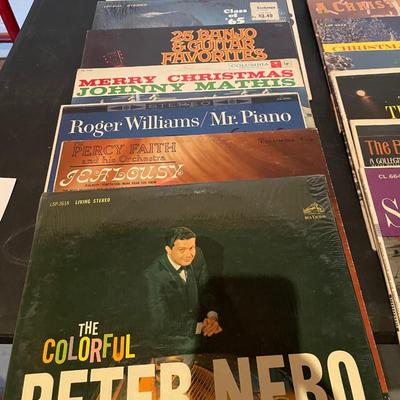 A LARGE SELECTION OF MUSIC ON VINYL RECORDS