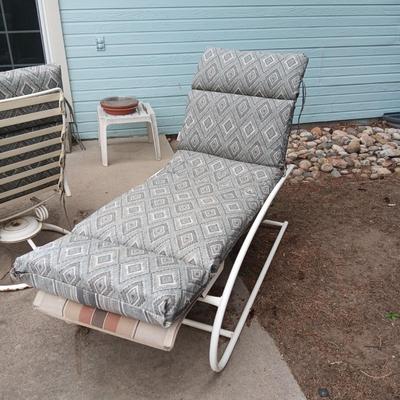 GLASS TOP PATIO TABLE W/4 HEAVY METAL ROCKING CHAIRS PLUS METAL LOUNGE CHAIR