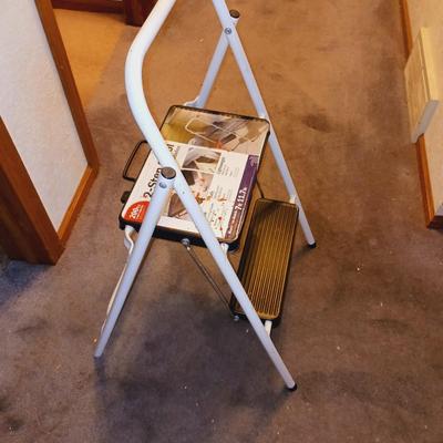 VARIETY OF CLEANING SUPPLIES AND A NEW STEP STOOL