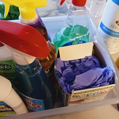 VARIETY OF CLEANING SUPPLIES AND A NEW STEP STOOL