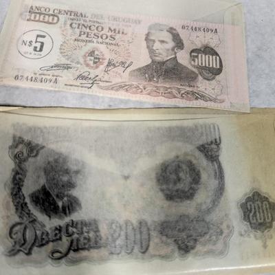 Foreign Banknotes includes WWII Japanese and Philippine Occupation Currency and 1983 Ugandan Shilling Lot V