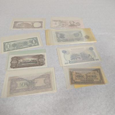 Foreign Banknotes includes WWII Japanese and Philippine Occupation Currency and 1983 Ugandan Shilling Lot V