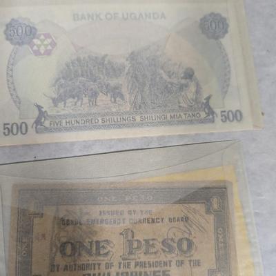 Foreign Banknotes includes WWII Japanese and Philippine Occupation Currency and 1983 Ugandan Shilling Lot V