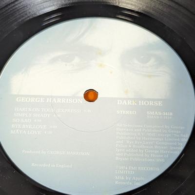Vintage George Harrison Vinyl Albums 'Darkhorse' and 'Living in the Material World'