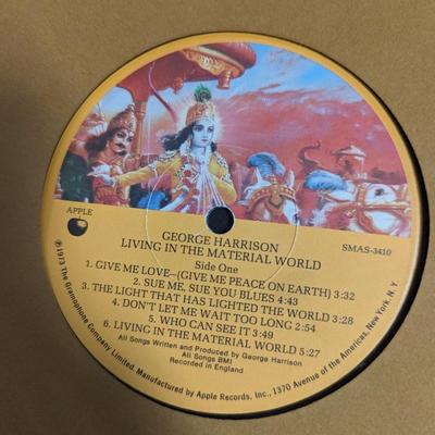 Vintage George Harrison Vinyl Albums 'Darkhorse' and 'Living in the Material World'