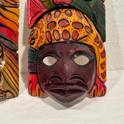 HAND CARVED AND PAINTED WOODEN MASKS