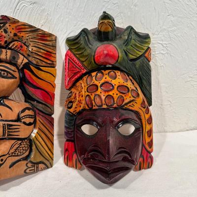 HAND CARVED AND PAINTED WOODEN MASKS