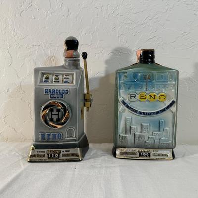 2 RENO JIM BEAM DECANTERS, 1 IS FULL
