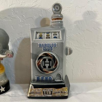 2 RENO AND AN ELEPHANT HOLDING THE WORLD JIM BEAM DECANTERS