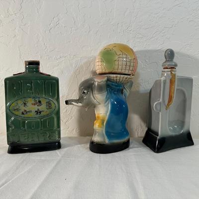 2 RENO AND AN ELEPHANT HOLDING THE WORLD JIM BEAM DECANTERS