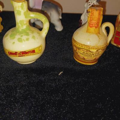 VINTAGE FIGURINES AND SOME OLD SEALED BOTTLES