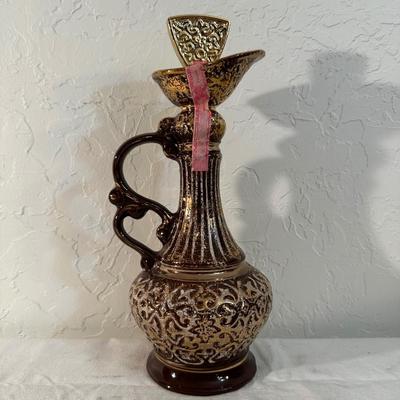 FULL 1980 SEALED GOLD TITAN DECANTER