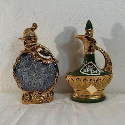 FULL JIM BEAM CHERUBS AND EMPTY GOLD AND GREEN DECANTER
