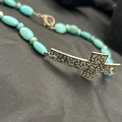 Turquoise tone howlite choker necklace with silver tone cross