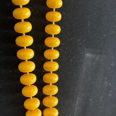 Vintage mustard colored wheel shaped beads