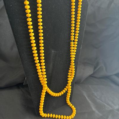 Vintage mustard colored wheel shaped beads