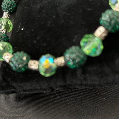 Silver tone and green beaded stretchy bracelet