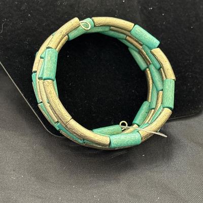 Turquoise and gold coil bangles Toned