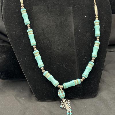 Turquoise tone skittle beaded necklace with skull pendant