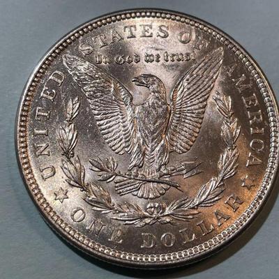 1921-P BRILLIANT UNCIRCULATED MORGAN SILVER DOLLAR AS PICTURED. (COIN #2)