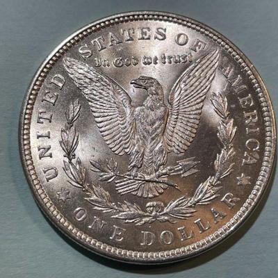 1921-P BRILLIANT UNCIRCULATED MORGAN SILVER DOLLAR AS PICTURED. (COIN #3)