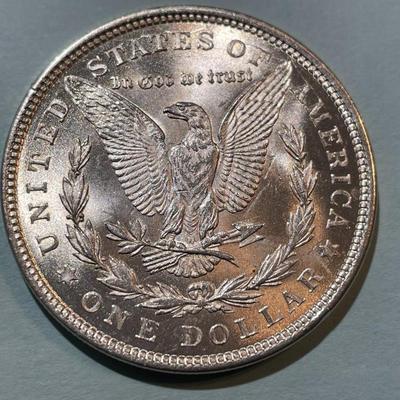 1921-P BRILLIANT UNCIRCULATED MORGAN SILVER DOLLAR AS PICTURED. (COIN #4)