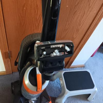 BISSELL BAGLESS VACUUM AND A STEP STOOL