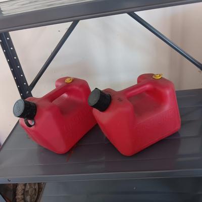METAL STORAGE SHELF AND 2 PLASTIC GAS CANS