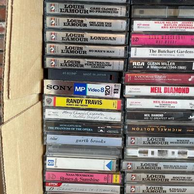 Lot of Audio Cassette Tapes and Sony Walkman