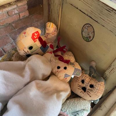 Antique Doll in a Crib