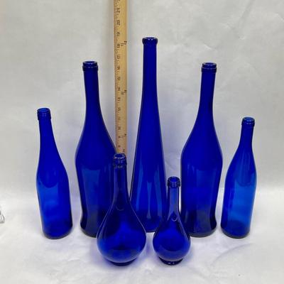 lot of 7 cobalt blue bottles - various sizes