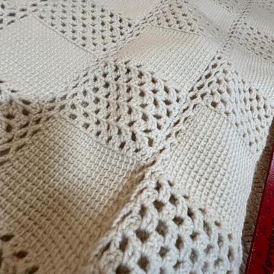 Two white lap robes