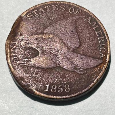 1858 CIRCULATED CONDITION w/SURFACE DAMAGE FLYING EAGLE CENT AS PICTURED. (COIN #11).
