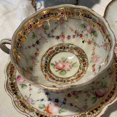 Assorted Bone China Teacups and Saucers