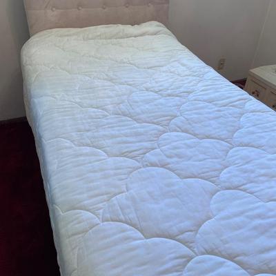 Twin memory foam mattress with soft plush head board