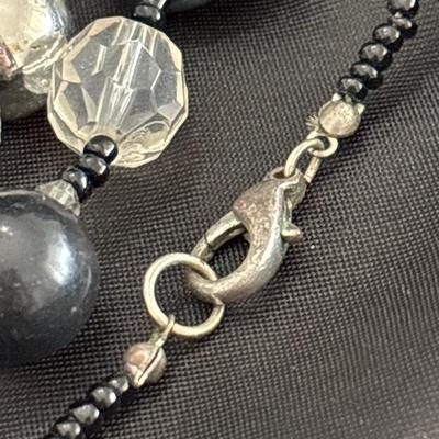 Black and clear long beaded necklace