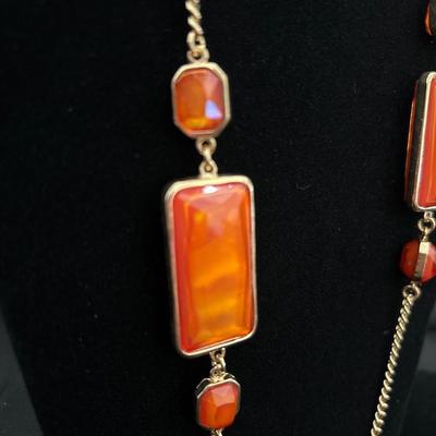 Gold, toned, beautiful fashion necklace with orange like stones