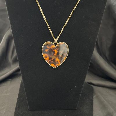 Cute part, gold toned faux tortoise shell necklace