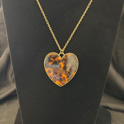Cute part, gold toned faux tortoise shell necklace